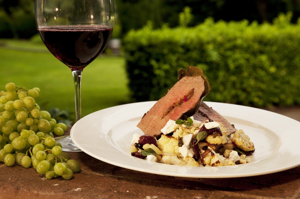 Lamb in fresh vine leaves with warm cauliflower salad resized