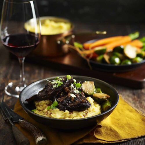 Beef Cheeks in Baharat Spice with Roasted Brussels Sprouts and Soft Polenta